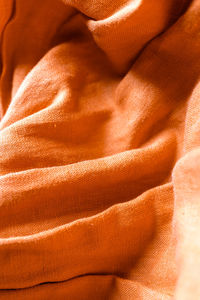 Orange linen fabric texture background , autumn beginning backdrops