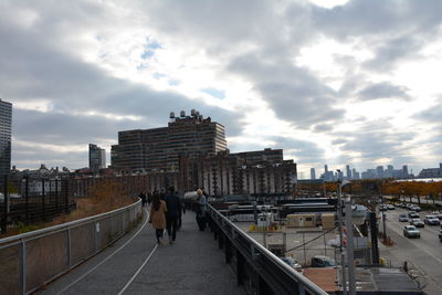 High angle view of buildings in city against sky