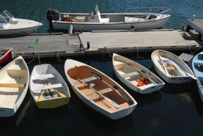 Boats moored at harbor