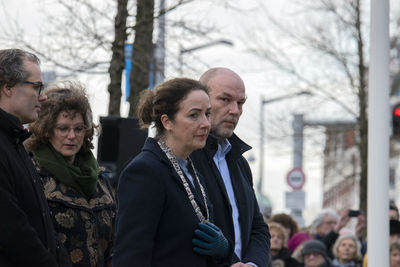 Portrait of people standing in park during winter