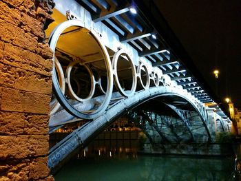 Building reflecting in water