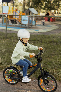 Smiling child cycling