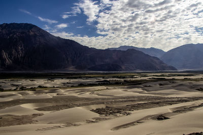 Scenic view of desert against sky