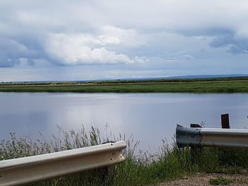 Scenic view of lake against sky