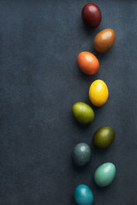 Close-up of multi colored candies against black background