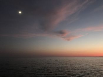 Scenic view of sea against sky at sunset