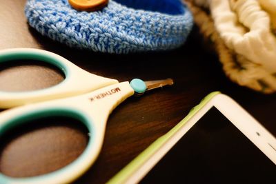 Close-up of scissors on table