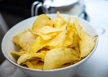 Close-up of potato chips in bowl