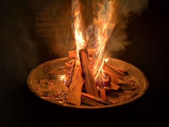 Close-up of bonfire in the dark