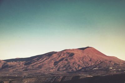 Scenic view of mountains against clear sky