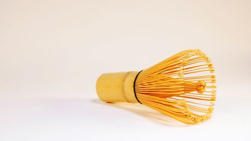 Close-up of cake against white background