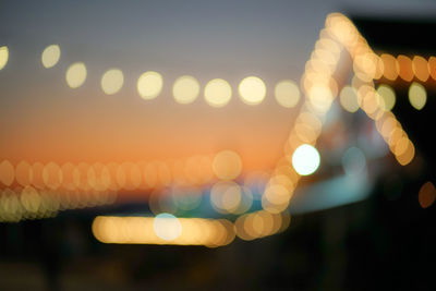 Defocused image of illuminated lights at night