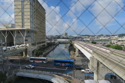 Bridge over highway against sky