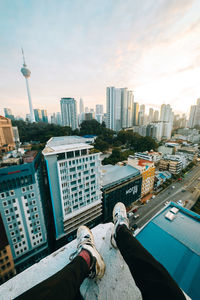 High angle view of buildings in city against sky