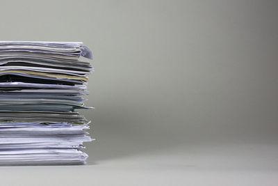 Stack of documents on table