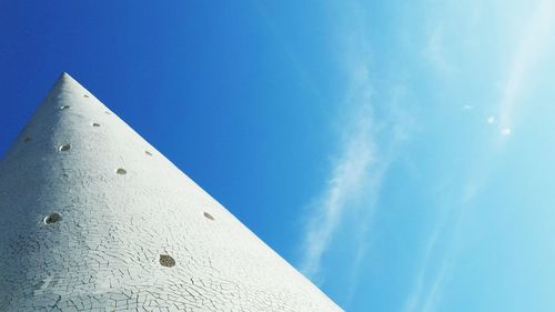 Low angle view of built structure against blue sky