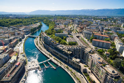 High angle view of river amidst buildings in city