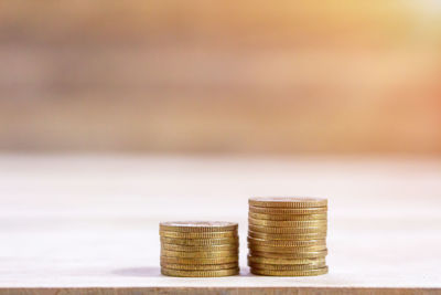 Close-up of coins on table