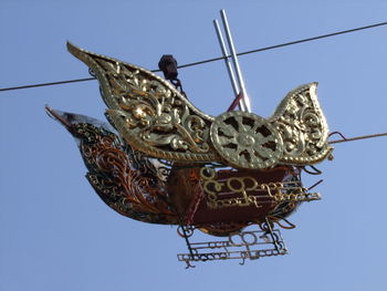 Low angle view of statue against clear sky