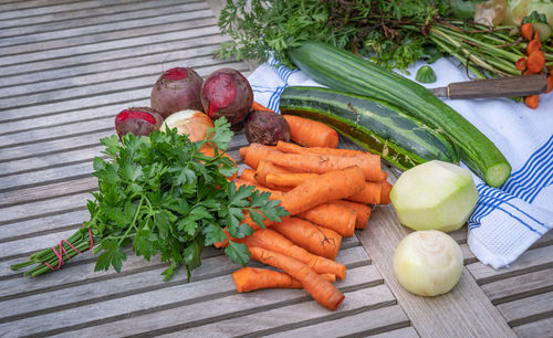 High angle view of fruits and vegetables on cutting board