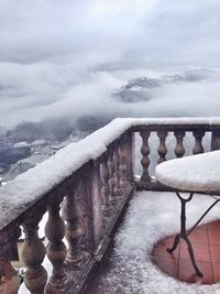 Close-up of snow on railings