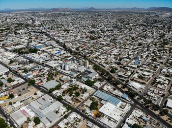 High angle shot of townscape against sky