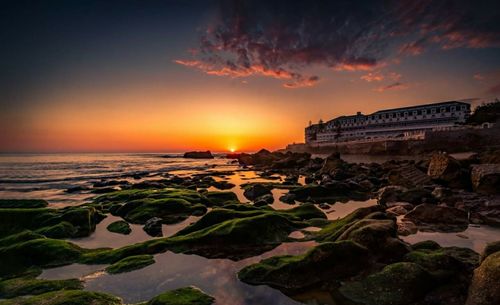 Scenic view of sea against sky during sunset