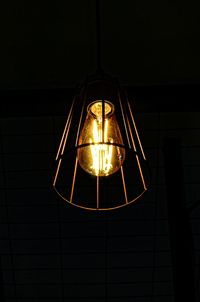 Low angle view of illuminated pendant light