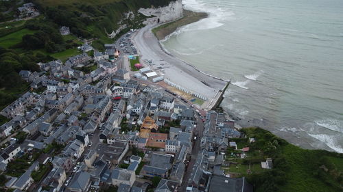 High angle view of townscape by sea