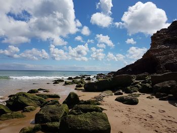 Scenic view of beach against sky