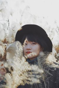 Portrait of young woman in snow