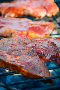 Close-up of meat on barbecue grill