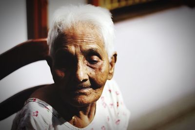 Close-up portrait of man at home