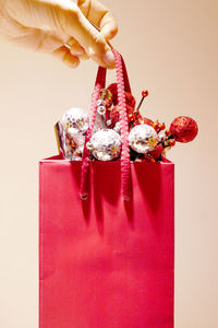 Close-up of hand holding ice cream