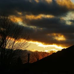 Scenic view of dramatic sky during sunset