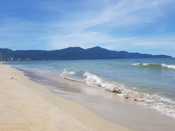 Scenic view of beach against sky