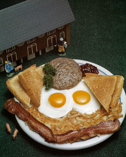 Close-up of breakfast served in plate