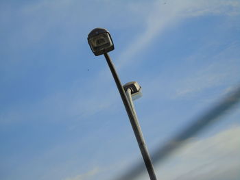 Low angle view of street light against sky