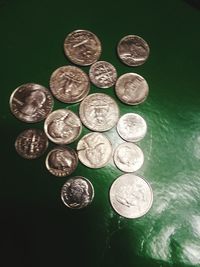 High angle view of coins on table