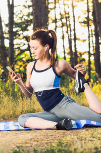Young woman using mobile phone