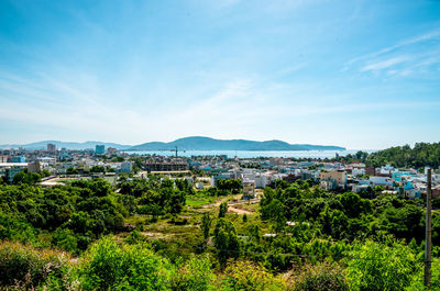 View of townscape against blue sky