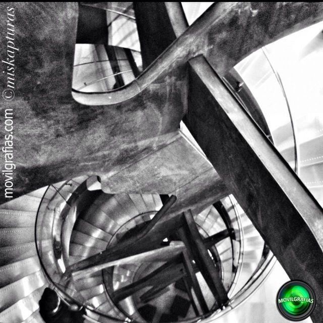 transportation, mode of transport, land vehicle, low angle view, high angle view, part of, steps, railing, steps and staircases, cropped, staircase, indoors, sunlight, built structure, architecture, wheel, day, tilt, car, no people