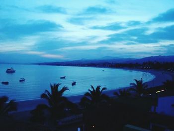 Scenic view of sea against sky at night