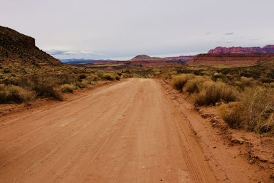 Dirt road passing through a desert