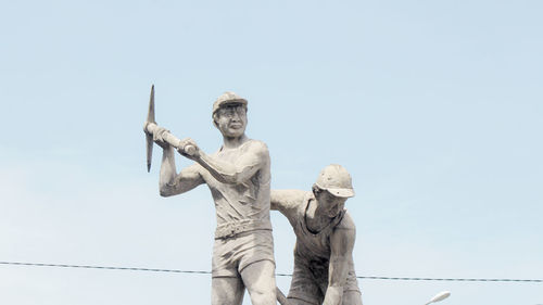 Low angle view of statue against clear sky