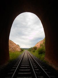 Railroad track passing through tunnel