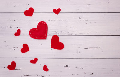 Close-up of red heart shape on table