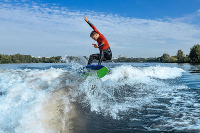 Man wakesurfing in moskva river