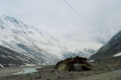 Scenic view of snow covered mountains