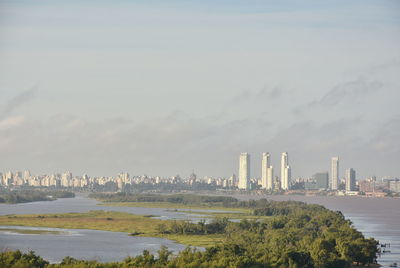 Modern cityscape against sky